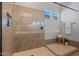 Spacious shower with tile surround and glass enclosure at 10535 E Palladium Dr, Mesa, AZ 85212