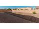 Large backyard with brick pavers and gravel at 11122 E Tripoli Ave, Mesa, AZ 85212