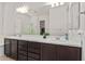 Double vanity bathroom with soaking tub and glass shower at 11122 E Tripoli Ave, Mesa, AZ 85212
