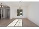 Dining room with window and access to kitchen at 11122 E Tripoli Ave, Mesa, AZ 85212