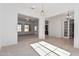 Open dining area with views into Gathering room and kitchen at 11122 E Tripoli Ave, Mesa, AZ 85212