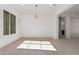 Sunlit dining room with large window and pendant light at 11122 E Tripoli Ave, Mesa, AZ 85212