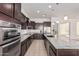 Kitchen with stainless steel appliances and ample counter space at 11122 E Tripoli Ave, Mesa, AZ 85212