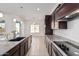 Spacious kitchen with granite countertops and stainless steel appliances at 11122 E Tripoli Ave, Mesa, AZ 85212