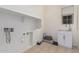 Laundry room with sink, cabinets, and space for washer and dryer at 11122 E Tripoli Ave, Mesa, AZ 85212
