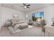 Spacious main bedroom with large windows and sitting area at 11122 E Tripoli Ave, Mesa, AZ 85212