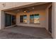 Covered patio with ceiling fan and sliding glass door access at 11122 E Tripoli Ave, Mesa, AZ 85212
