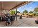 Relaxing patio with seating area and view of golf course at 15192 W Las Brizas Ln, Sun City West, AZ 85375