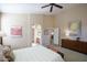 Main bedroom with access to bathroom and additional sitting area at 18315 N Canal Dr, Surprise, AZ 85374