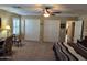 Well-lit bedroom with double closets and carpet flooring at 2101 S Meridian Rd # 248, Apache Junction, AZ 85120