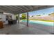 Covered patio area with pool, table, and chairs at 224 E Eugie Ave, Phoenix, AZ 85022