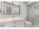 Modern bathroom with updated vanity, shower, and tile floor at 332 N 56Th St, Mesa, AZ 85205