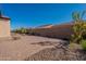 Landscaped backyard with paver patio and desert landscaping at 375 E Bracciano Ave, Queen Creek, AZ 85140