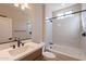 Clean bathroom with a bathtub, shower, and modern vanity at 375 E Bracciano Ave, Queen Creek, AZ 85140