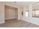 Bright dining room with hardwood floors and open concept at 375 E Bracciano Ave, Queen Creek, AZ 85140