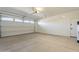 Spacious garage with overhead door and extra storage space at 375 E Bracciano Ave, Queen Creek, AZ 85140