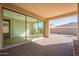 Covered patio with brick flooring and access to the backyard at 375 E Bracciano Ave, Queen Creek, AZ 85140
