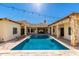 Inviting rectangular pool with stone coping at 5791 S Columbus Ct, Gilbert, AZ 85298