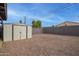 White storage shed in the backyard at 8825 N 29Th Ave, Phoenix, AZ 85051