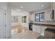 Modern kitchen with stainless steel appliances and granite countertops at 1670 E Joseph Way, Gilbert, AZ 85295