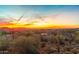 Aerial view of property at sunset with desert landscape at 2724 S Falling Star Rd, Gold Canyon, AZ 85118