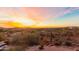 Property with desert landscape and distant city lights at 2724 S Falling Star Rd, Gold Canyon, AZ 85118