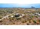 Two story house nestled in a desert landscape at 2724 S Falling Star Rd, Gold Canyon, AZ 85118