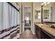 Bathroom features granite countertop, shower and view to upper hallway at 2724 S Falling Star Rd, Gold Canyon, AZ 85118