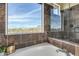 Bathroom with a large window showcasing mountain views at 2724 S Falling Star Rd, Gold Canyon, AZ 85118