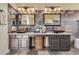 Large bathroom with double vanities, copper sinks, and granite countertops at 2724 S Falling Star Rd, Gold Canyon, AZ 85118