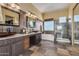 Spa-like bathroom with soaking tub, walk-in shower, and mountain views at 2724 S Falling Star Rd, Gold Canyon, AZ 85118