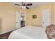 Bright bedroom with double doors and access to upper hallway at 2724 S Falling Star Rd, Gold Canyon, AZ 85118