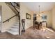 Bright dining room with a chandelier and hardwood floors at 2724 S Falling Star Rd, Gold Canyon, AZ 85118