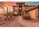 Two-story home with desert landscaping and sunset view at 2724 S Falling Star Rd, Gold Canyon, AZ 85118