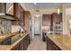 Kitchen with granite counters, stainless steel appliances, and tile backsplash at 2724 S Falling Star Rd, Gold Canyon, AZ 85118