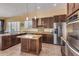 Spacious kitchen featuring granite countertops and stainless steel appliances at 2724 S Falling Star Rd, Gold Canyon, AZ 85118