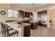 L-shaped kitchen with granite counters and stainless steel appliances at 2724 S Falling Star Rd, Gold Canyon, AZ 85118