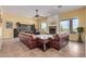 Spacious living room with a fireplace and large windows offering scenic views at 2724 S Falling Star Rd, Gold Canyon, AZ 85118