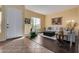 Living area with dark hardwood floors and neutral decor near entryway at 2724 S Falling Star Rd, Gold Canyon, AZ 85118