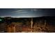 Night view from deck with city lights in the background at 2724 S Falling Star Rd, Gold Canyon, AZ 85118