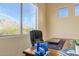 Home office features a large window with mountain views at 2724 S Falling Star Rd, Gold Canyon, AZ 85118