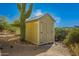 Tan storage shed in backyard at 2724 S Falling Star Rd, Gold Canyon, AZ 85118