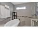 Relaxing bathroom with a soaking tub and shower at 3401 N Dakota St, Chandler, AZ 85225