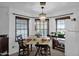 Cozy breakfast nook with a table and chairs near a window at 3401 N Dakota St, Chandler, AZ 85225