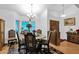 Formal dining room with a large wood table and six chairs at 3401 N Dakota St, Chandler, AZ 85225