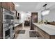 Modern kitchen with stainless steel appliances and white countertops at 3401 N Dakota St, Chandler, AZ 85225