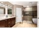 Spa-like bathroom with a soaking tub and walk-in shower at 4311 E Roma Ave, Phoenix, AZ 85018