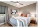 Bright bedroom with a comfortable bed and plenty of natural light at 4311 E Roma Ave, Phoenix, AZ 85018