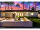 Inviting front entrance with fire pit and modern landscaping at 4311 E Roma Ave, Phoenix, AZ 85018