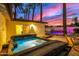 Hot tub area with palm trees and a beautiful sunset at 4311 E Roma Ave, Phoenix, AZ 85018